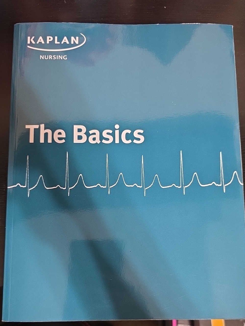 Kaplan Nursing Teal Textbook with ECG Graphic